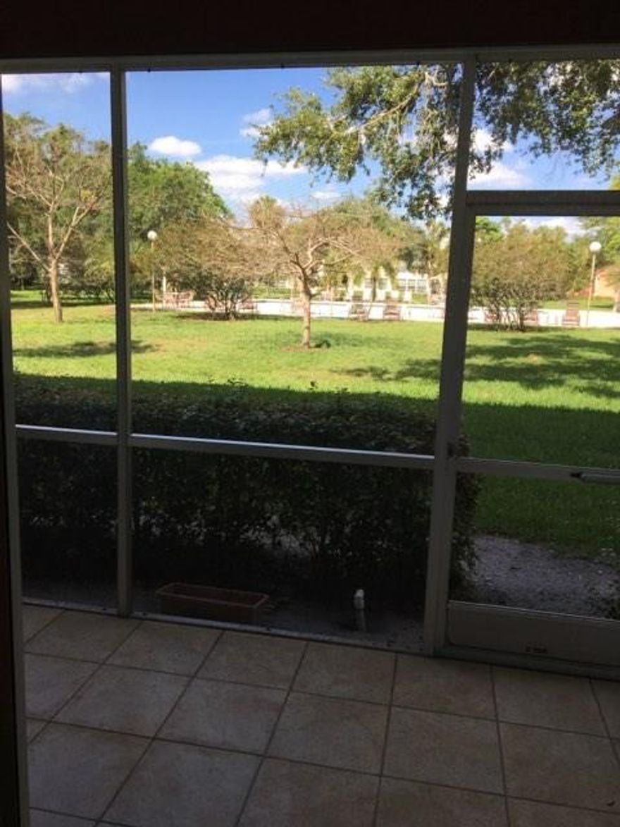One of the most desirable buildings in Wynmoor, right next to the theater & main pool. All Tiled Floors. From your patio is a very short walk to swimming pool. Completely Furnished. Washer & Dryer Included. Association claims 55+ communityUnit is in Probate.
