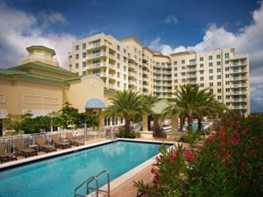 Spacious 2 bedroom 2 bathroom with wrap around balcony. Granite counters and stainless steel appliances.Elegant bathrooms with Crema Marfil marble counters and floorings. Resort like amenities such as a expansive sundeck w/ 2 pools & spa, fitness center, business center, valet and attended lobby. Enjoy luxurious resort living in the heart of heart of Boynton Beach! Pet friendly building!