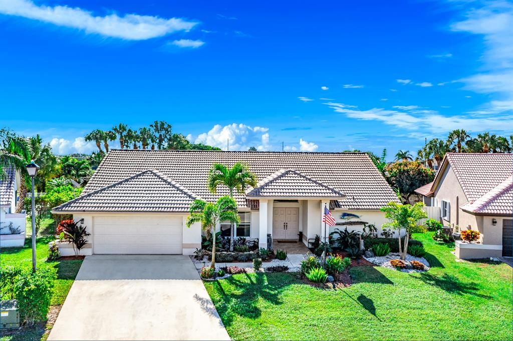 Photo of 6766 Blue Bay Circle Cir, Lake Worth Beach, FL 33467 (MLS # R10772652)