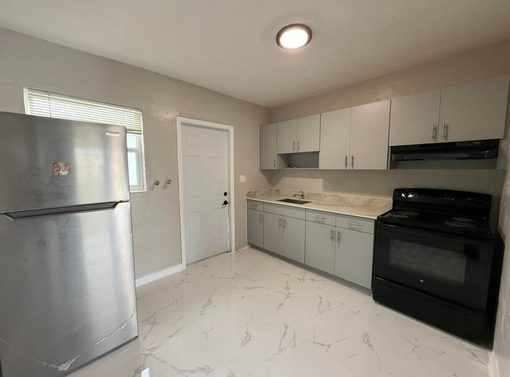 Photo of 832 NW 10TH Street #2, Hallandale Beach, FL 33009 (MLS # B26082131)