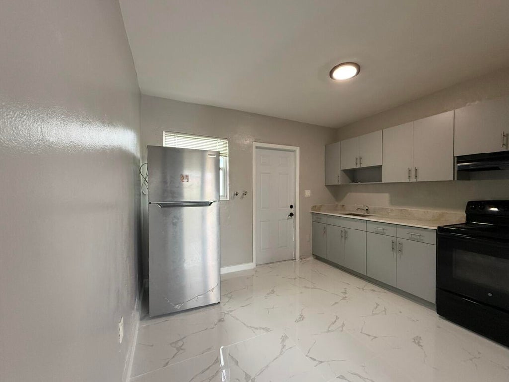 Photo of 832 NW 10TH Street #2, Hallandale Beach, FL 33009 (MLS # B26082131)