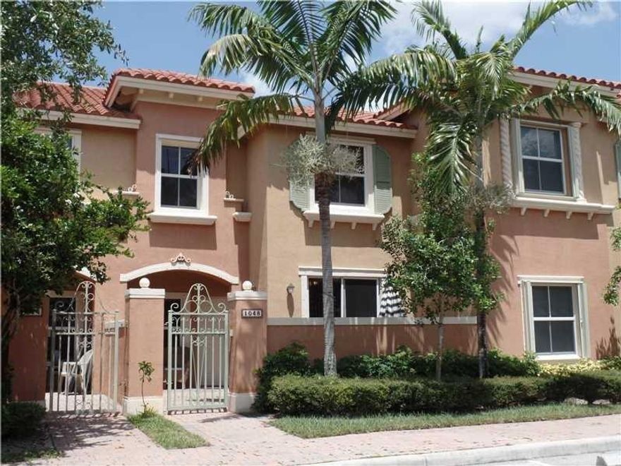 3 BEDROOM 2.5 BATHROOM TOWNHOUSE IN ONE OF PEMBROKE PINES MOST COVETED COMMUNITIES. BEAUTIFULLY GATED ENTRANCE AND LANDSCAPED COMMUNITY LOCATED JUST ACROSS THE STREET FROM THE SHOPPES OF PEMBROKE GARDENS FEATURING SHOPS AND RESTAURANTS. EASY ACCESS TO I-75 FOR A GREAT COMMUTE TO WORK. THIS TOWNHOUSE FEATURES A DOWNSTAIRS WITH LIVING ROOM, DINING ROOM, FAMILY ROOM AND KITCHEN WITH EAT-ON COUNTER. NEWER WOOD FLOORS UPSTAIRS TO THE BEDROOMS. MASTER BEDROOM HAS DUAL CLOSETS. COMMUNITY HAS POOL AND TOT LOTS.