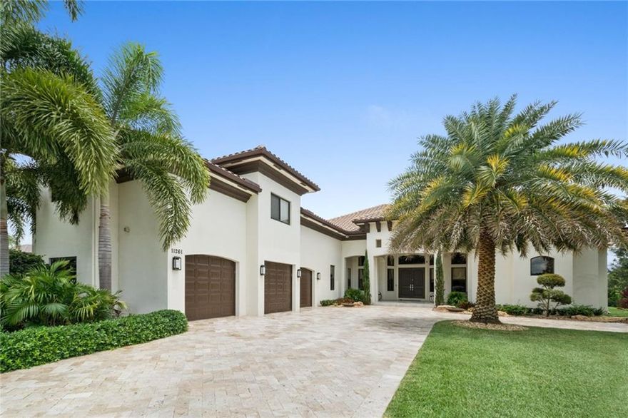 This beautiful custom Brookman Fels model has all the bells and whistles and more. A bldrs acre with stone pavers both front and back., over sized lap pool off 2 covered patios with summer kitchen for outdoor entertaining.   Kitchen is a chef's delight 2 islands, Thermador appliances with separate refrigerator and freezer with wine column in the center.  6 burner gas cooking    Real wood flooring in master and den ( maple and walnut) and marble throughout.  Garage is 1040 sq ft. game room is 37x23.