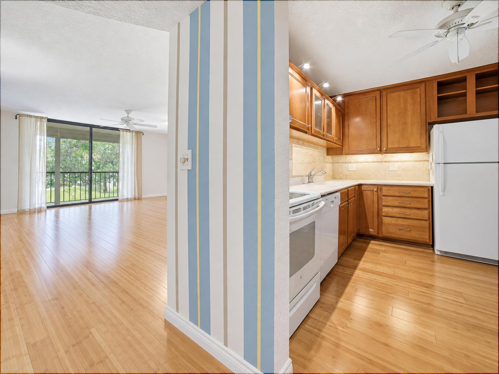 Photo of 5340 LAS VERDES Circle #202, Delray Beach, FL 33484 (MLS # B26078353)
