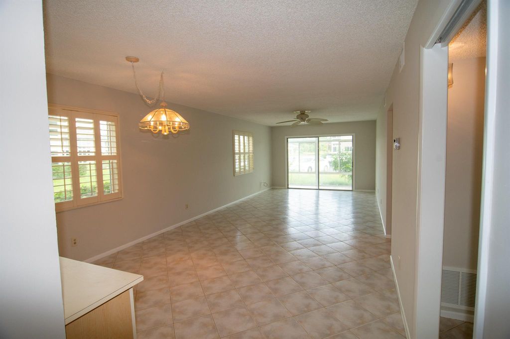 Photo of 7 Lake Vista Trail #102, Port Saint Lucie, FL 34952 (MLS # R10933393)