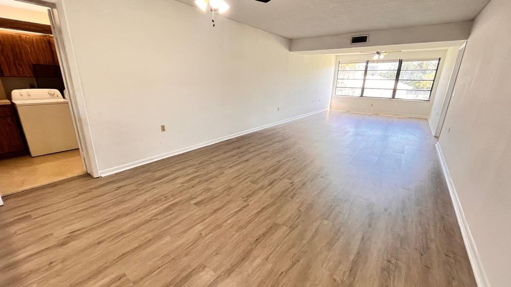 Photo of 3511 Village Boulevard #Unit 206, West Palm Beach, FL 33409 (MLS # B26027301)