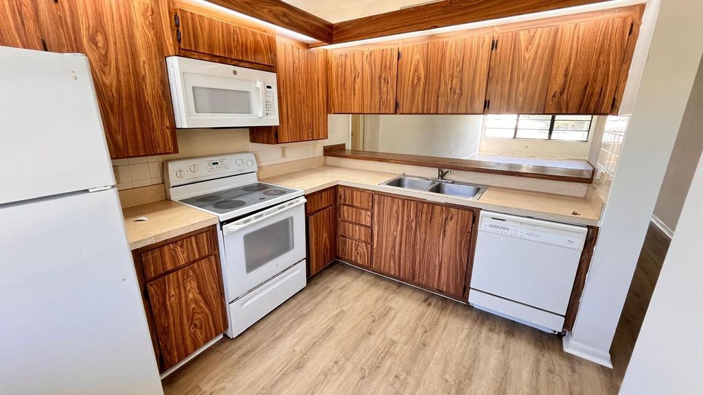 Photo of 3511 Village Boulevard #Unit 206, West Palm Beach, FL 33409 (MLS # B26027301)