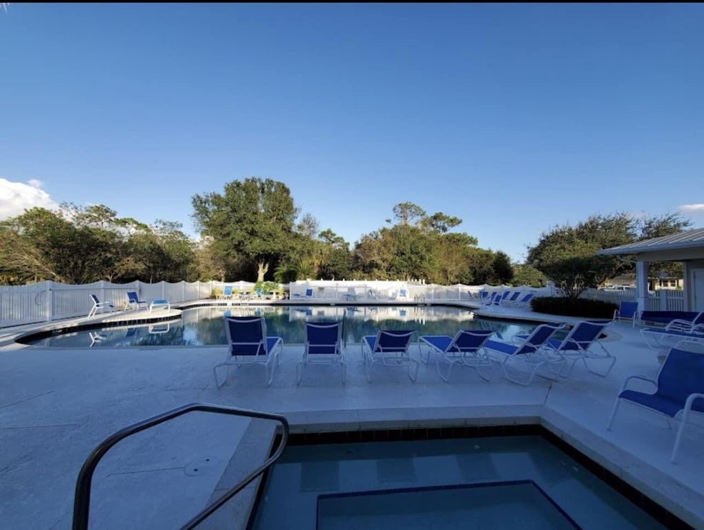 Photo of 672 NE Bent Paddle Lane, Port Saint Lucie, FL 34983 (MLS # R10988769)