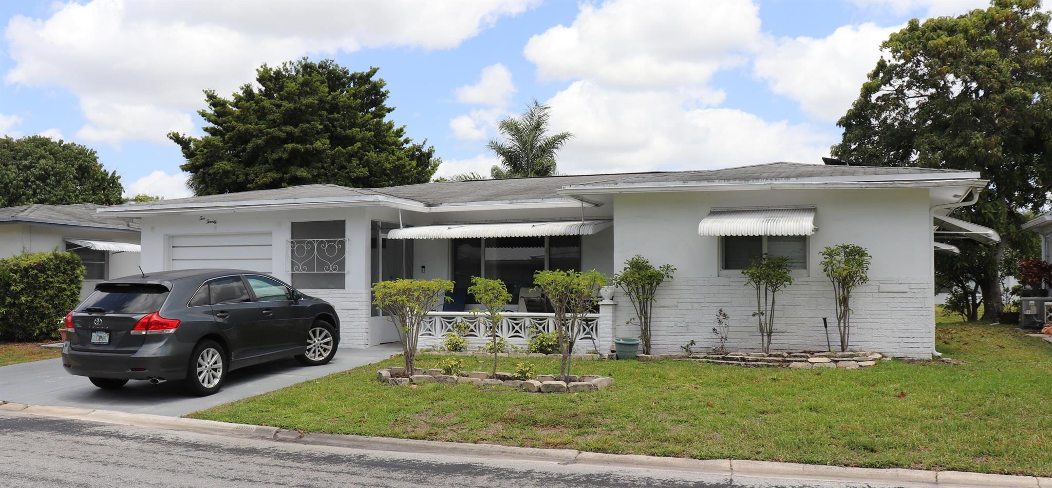 🌞 Great opportunity in a tranquil 55+ community! This bright and spacious home offers 1,941 sq ft of living space with tile flooring throughout, an updated kitchen, and a new A/C installed in 2018, Roof was install in Feb 2006 Impact windows provide peace of mind, and solar panels help keep electric bills low (buyer to assume $180/mo contract). Enjoy a large family room, low monthly maintenance of just $90, and a custom double driveway. Don't miss this energy-efficient gem!