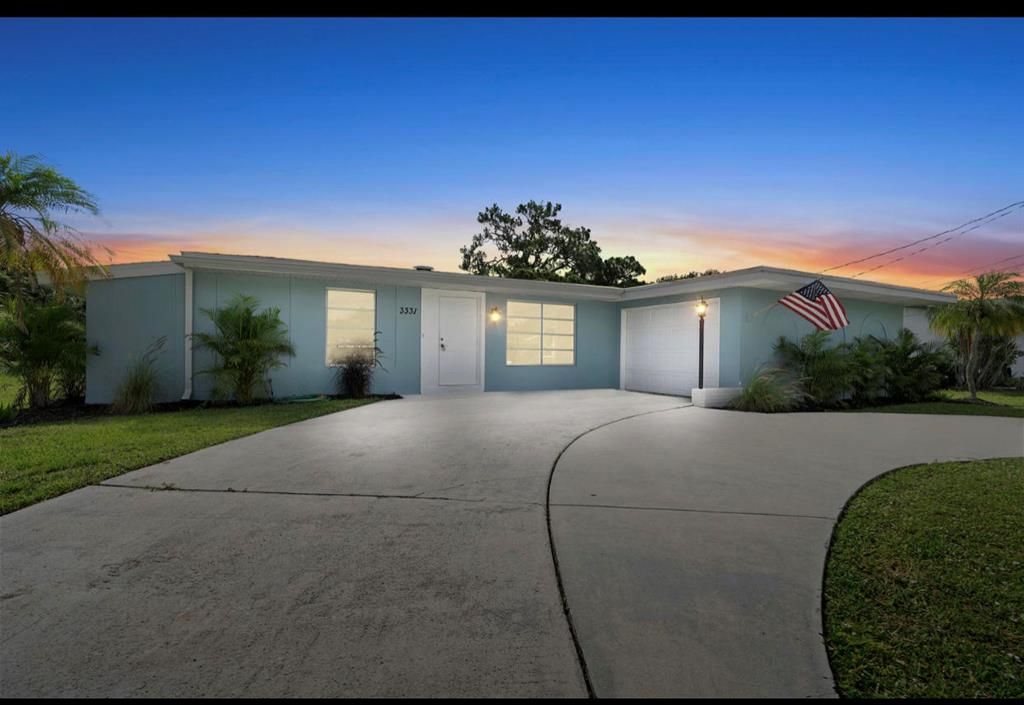 Photo of 3331 SE Monte Vista Street, Port Saint Lucie, FL 34952 (MLS # R10736121)