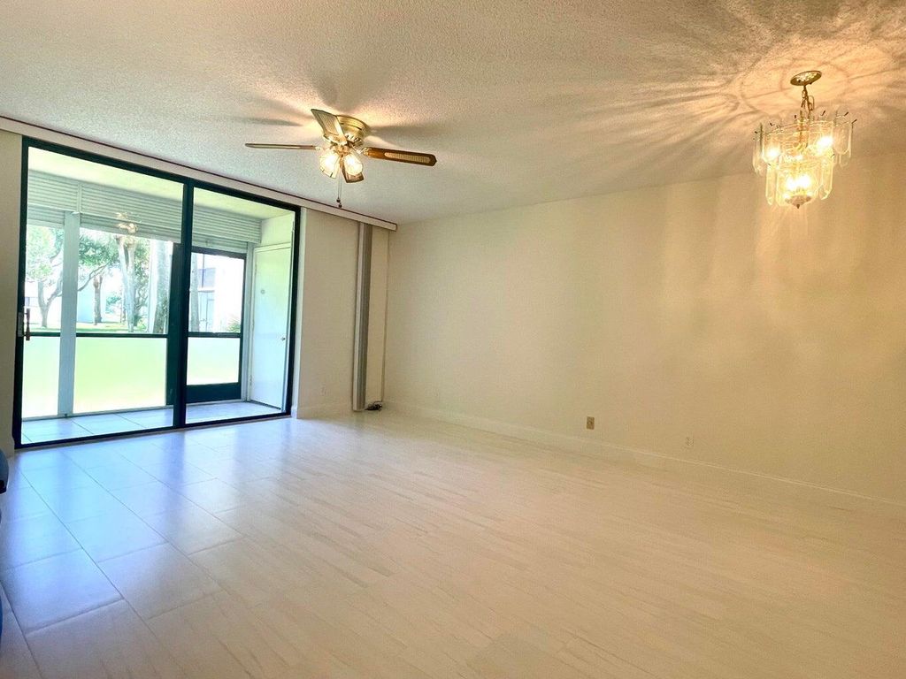 Photo of 5130 Las Verdes Circle #102, Delray Beach, FL 33484 (MLS # R11162307)