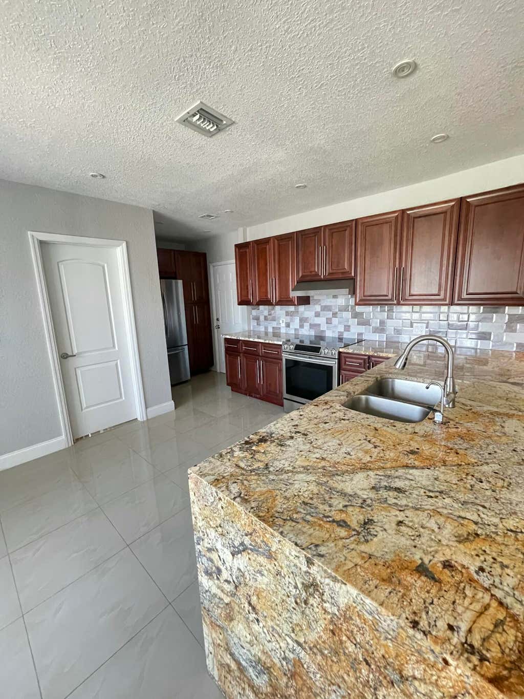 Photo of 255 Foresteria Drive, Lake Park, FL 33403 (MLS # B26036105)