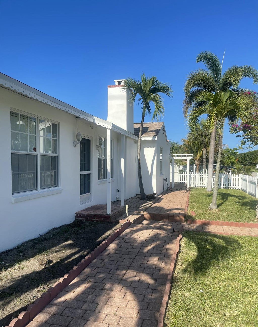 Photo of 255 Foresteria Drive, Lake Park, FL 33403 (MLS # B26036105)