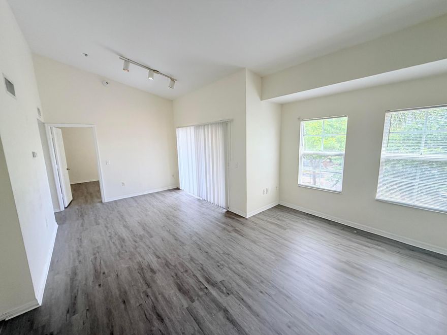 Don't miss the opportunity to live in this charming garden-view unit located in the gated community of Emerald Isle!  This 1 Bed/1 Bath unit features high ceilings, new laminated floors throughout, and an in-unit washer/dryer. Modern comforts like A/C, refrigerator, and ceiling fans ensure added comfort. Enjoy resort-style amenities including a pool, clubhouse, gym, tennis and racquetball courts, and recreation rooms.  Conveniently located just minutes from shopping, entertainment, nightlife, and all that West Palm Beach has to offer. This warm, quiet and friendly neighborhood is perfect for you and your loved ones. Excellent maintenance and a well-kept community make it an ideal place to call home.