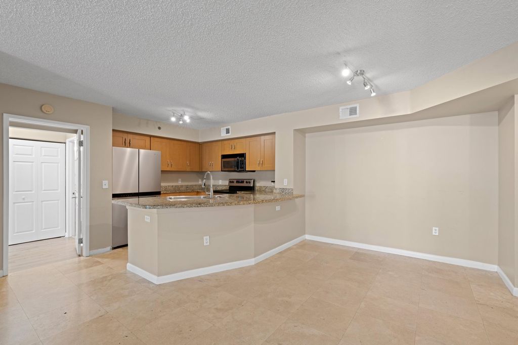 Photo of 3133 Clint Moore Road #103, Boca Raton, FL 33496 (MLS # R10957170)
