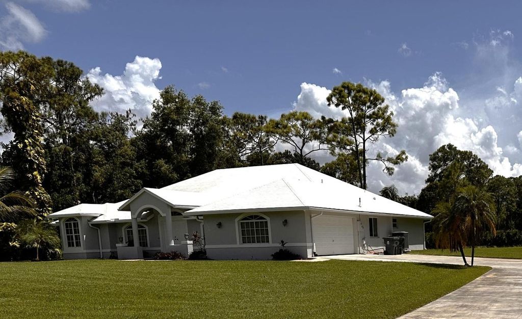 Photo of 13576 48th Court N, West Palm Beach, FL 33411 (MLS # R11120827)