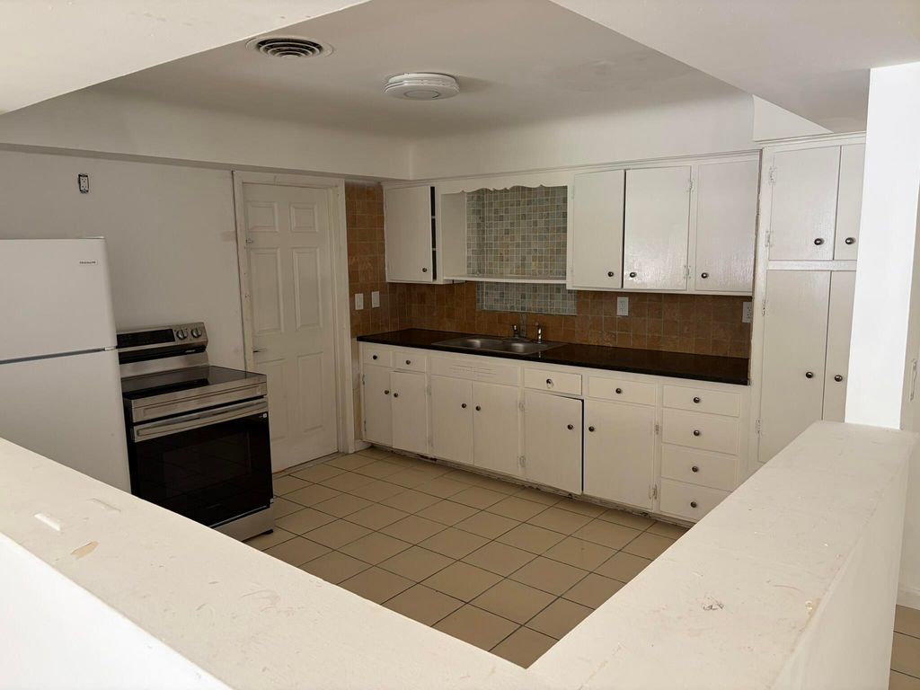 Photo of 1980 Kirk Road, West Palm Beach, FL 33406 (MLS # B26022015)