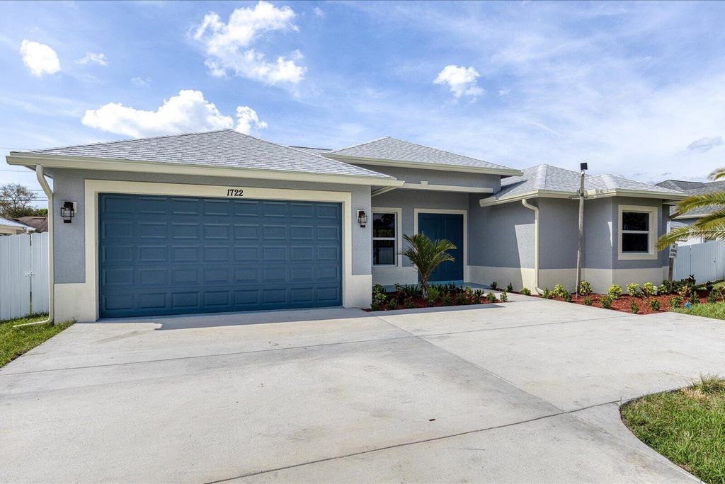 Photo of 1722 SW California Boulevard, Port Saint Lucie, FL 34953 (MLS # R11064587)