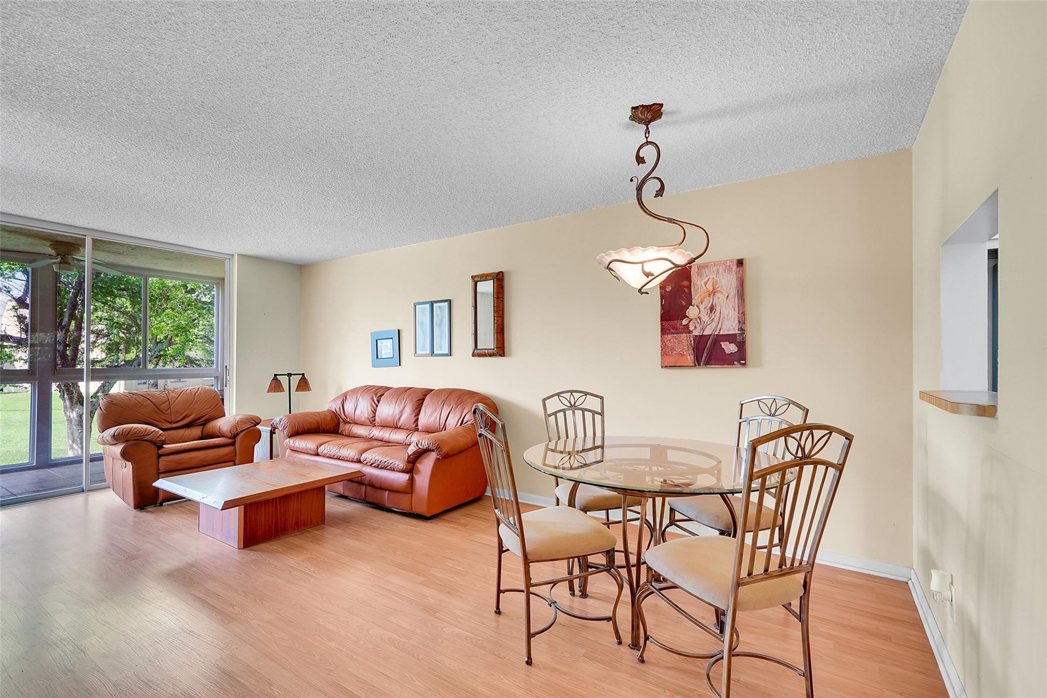 55+ COMMUNITY, THIS TURN KEY READY UNIT IS ON THE 2nd FLOOR, WELL KEPT BUILDING #97. CORNER UNIT. PICTURESQUE WATER AND GOLF VIEWS FROM IMPACT WINDOWS. LIGHT AND BRIGHT, STAINLESS STEEL REFRIGERATOR, DISHWASHER, LAMINATE AND TILE FLOORING IT IS LOCATED RIGHT NEAR TO A SATELLITE YEAR-ROUND HEATED POOL, SAUNA, BILLARD, TENNIS AND PICKLEBALL COURT. MOTIVATED SELLER.