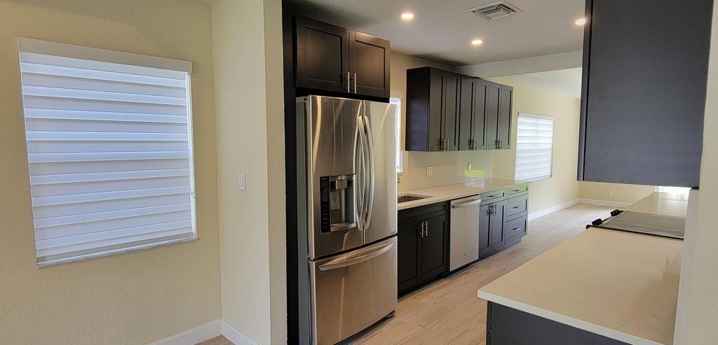 Photo of 1916 SW 28th Way, Fort Lauderdale, FL 33312 (MLS # B26011690)