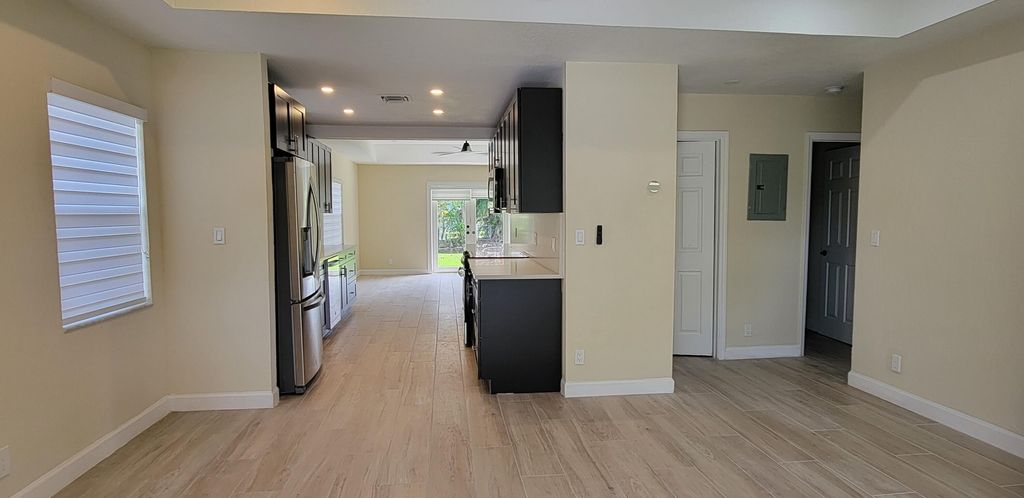 Photo of 1916 SW 28th Way, Fort Lauderdale, FL 33312 (MLS # B26011690)