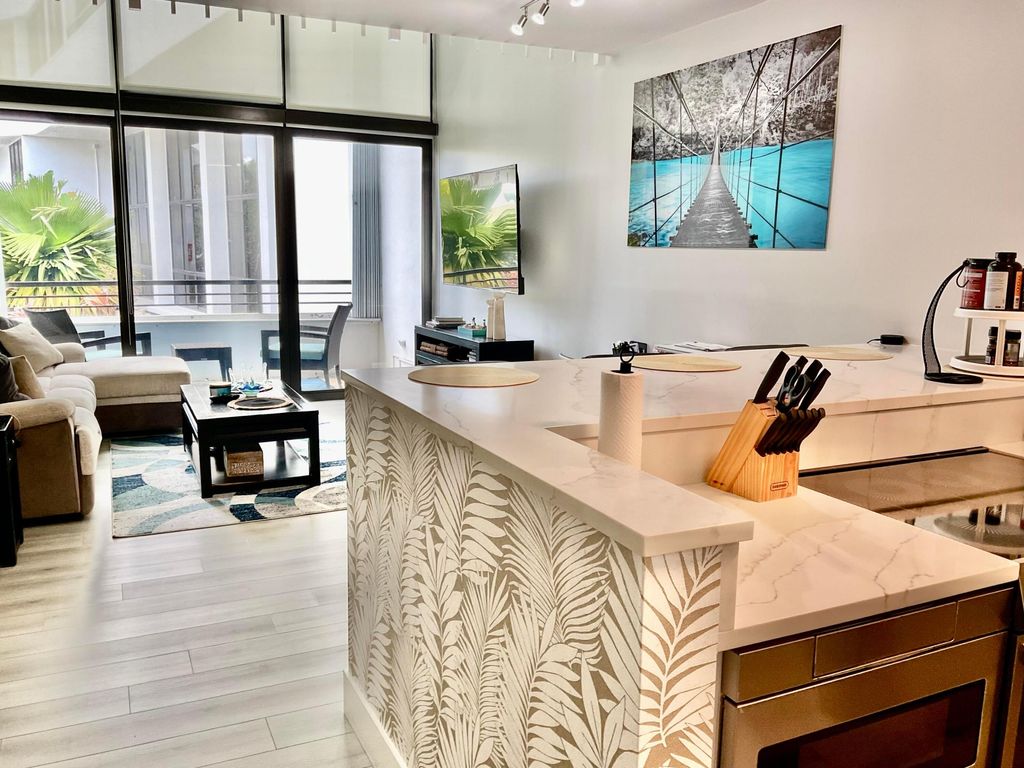 Photo of 3589 S Ocean Boulevard #30, South Palm Beach, FL 33480 (MLS # B26028491)