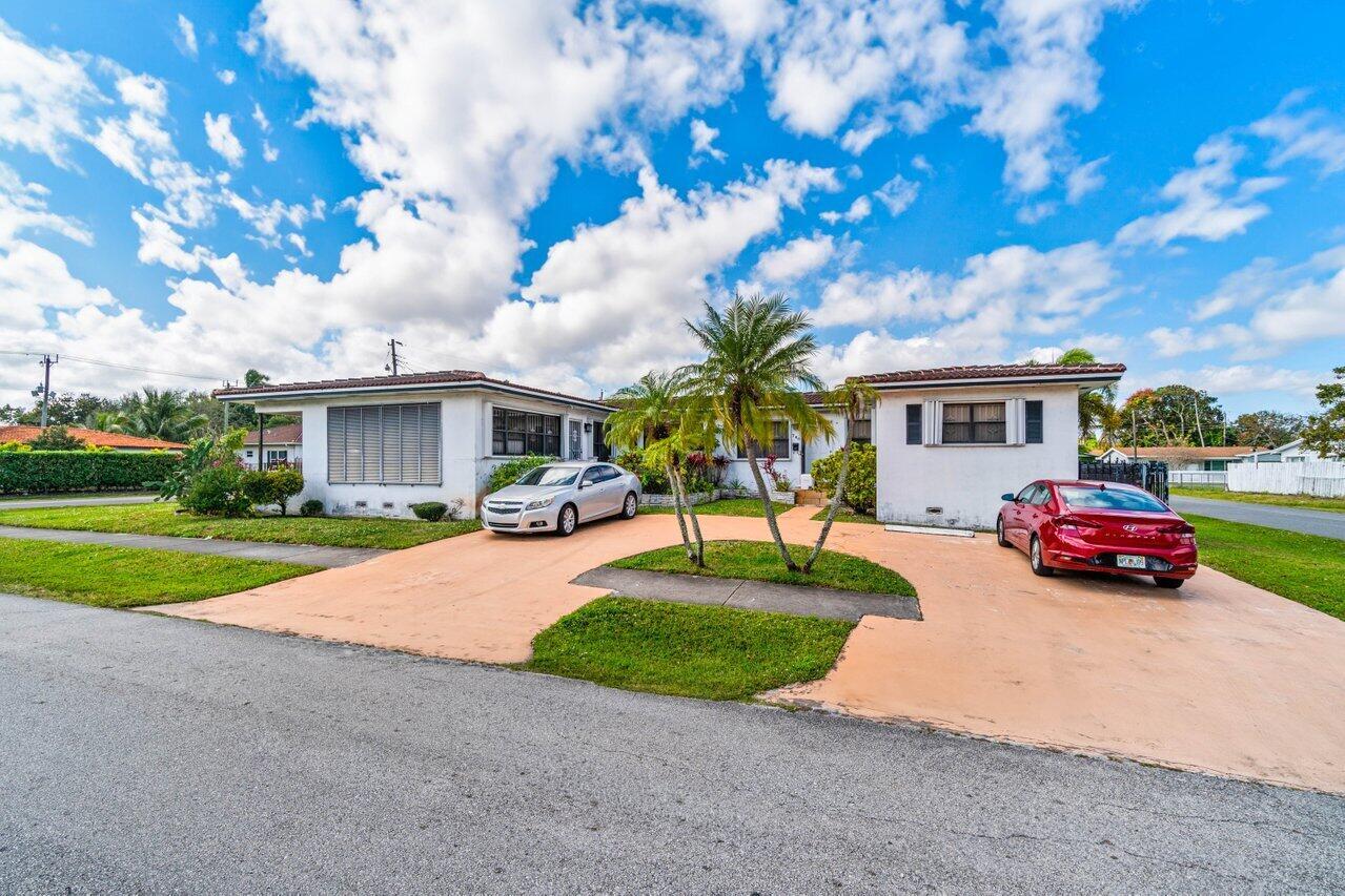 Attention Investors! Don't pass up on this i duplex in Hallandale Beach! Located on a large corner lot, this duplex enjoys close proximity to plenty of dining, the prestigious Aventura mall and beautiful beaches.Unit one is currently occupied and both units offer plenty of parking. Unit one features two bedrooms and two full bathrooms and has a nice garden and patio area. Unit two contains tile floors, one bedroom and one full bathroom that was partially remodeled in 2024. Each unit possess its own water, gas and electric meter and tenants are responsible for paying utilities. CASH ONLY. Property is being sold AS-IS.