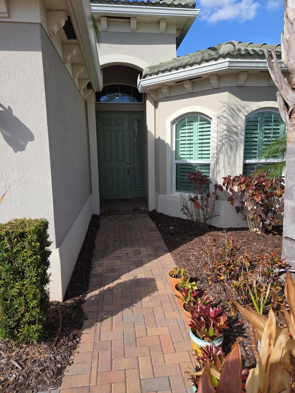 Photo of 11441 SW Lake Park Drive, Port Saint Lucie, FL 34987 (MLS # B26018097)