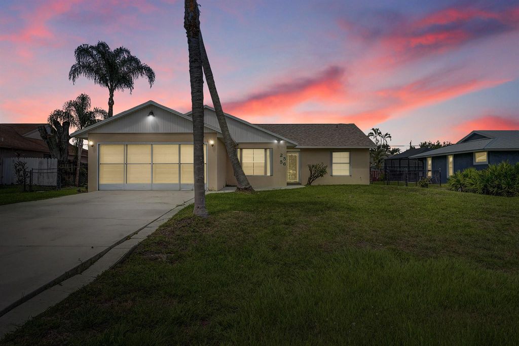 Photo of 2556 SW Cameo Boulevard, Port Saint Lucie, FL 34953 (MLS # R11101628)