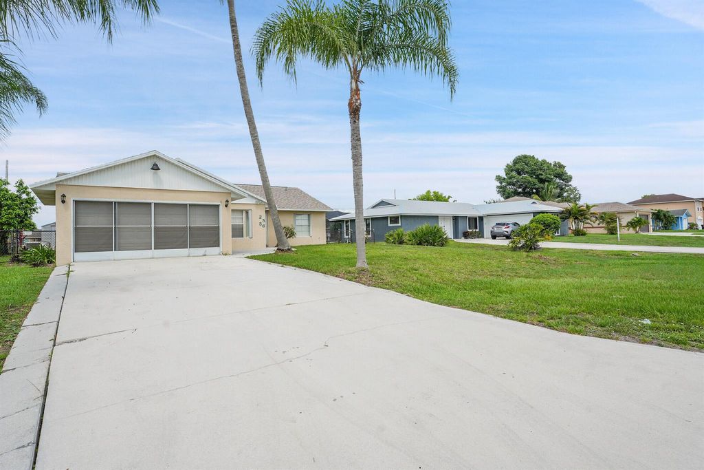 Photo of 2556 SW Cameo Boulevard, Port Saint Lucie, FL 34953 (MLS # R11101628)