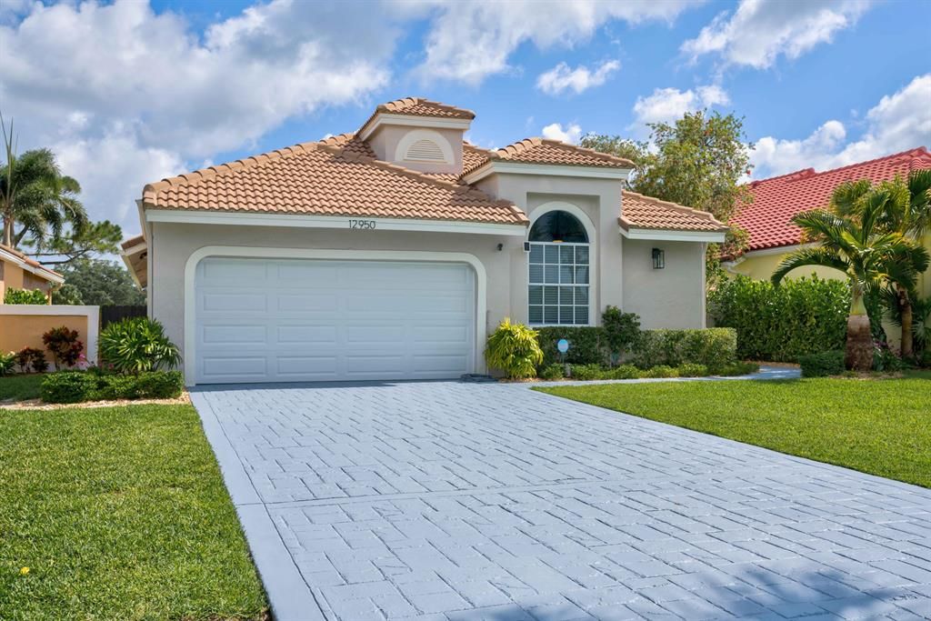 Photo of 12950 Touchstone Place Pl, West Palm Beach, FL 33418 (MLS # R10723109)