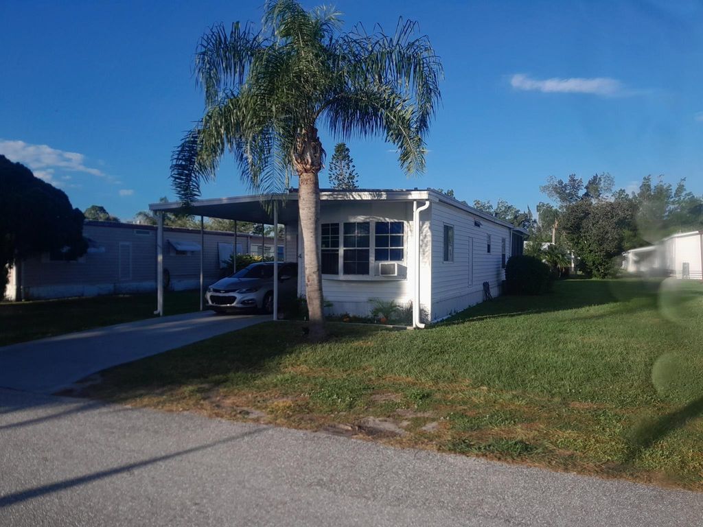 Photo of 4 La Costa Lane, Port Saint Lucie, FL 34952 (MLS # R10931942)