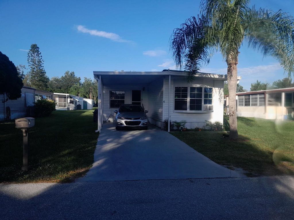 Photo of 4 La Costa Lane, Port Saint Lucie, FL 34952 (MLS # R10931942)