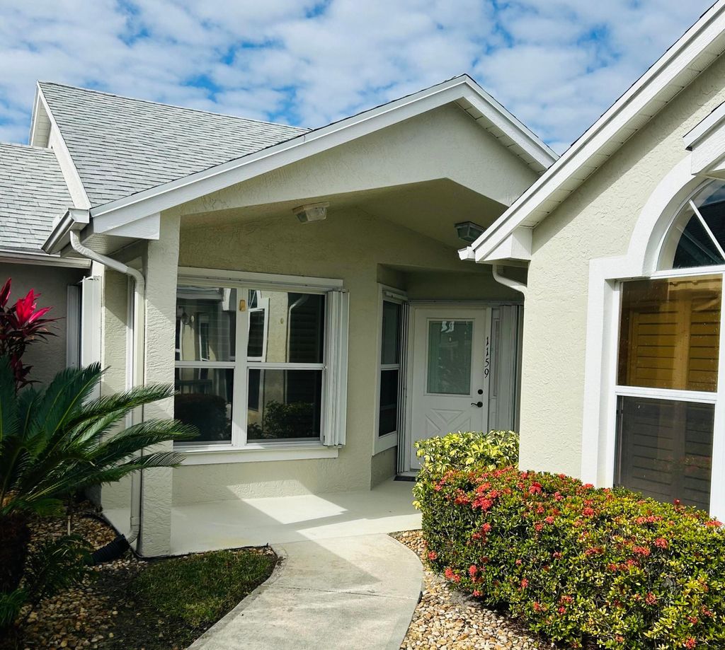 Photo of 1159 NW Lombardy Drive, Port Saint Lucie, FL 34986 (MLS # R11158634)