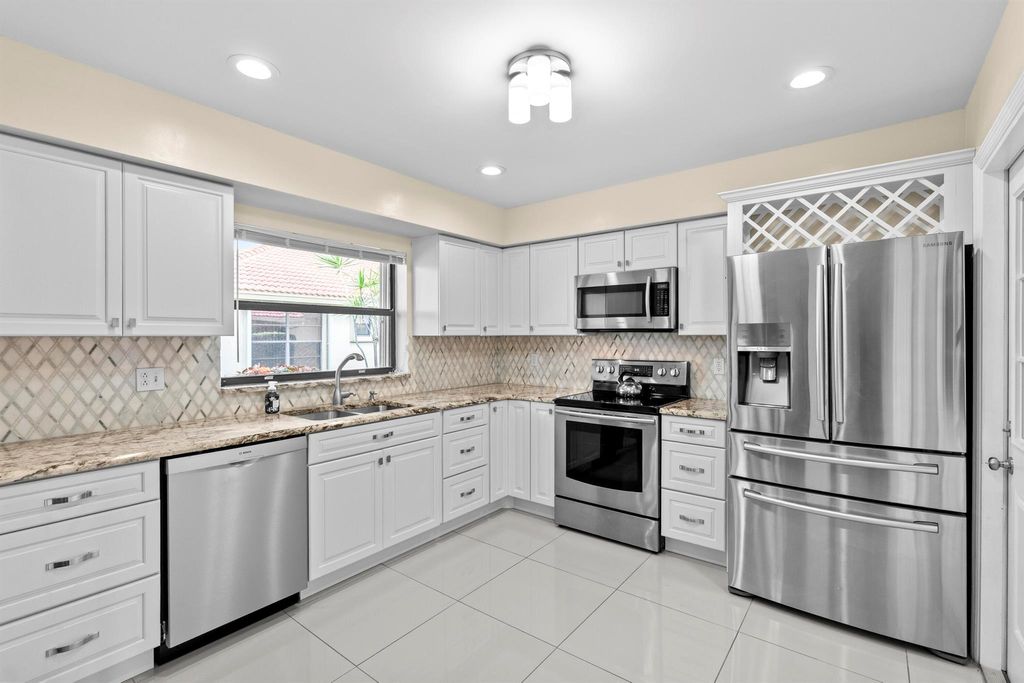 Photo of 4440 Pandana Tree Road #A, Boynton Beach, FL 33436 (MLS # R11087000)
