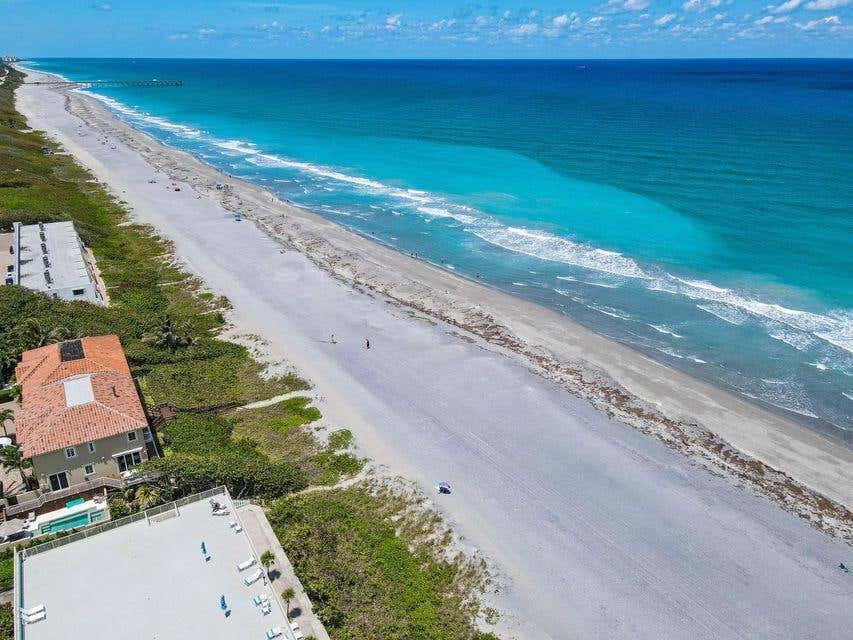 Photo of 941 Ocean Drive, Juno Beach, FL 33408 (MLS # B26060022)