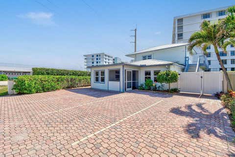 Photo of 941 Ocean Drive, Juno Beach, FL 33408 (MLS # B26060022)