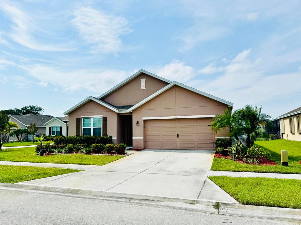Photo of 2251 SW Garfield Drive SW, Vero Beach, FL 32968 (MLS # B26076744)