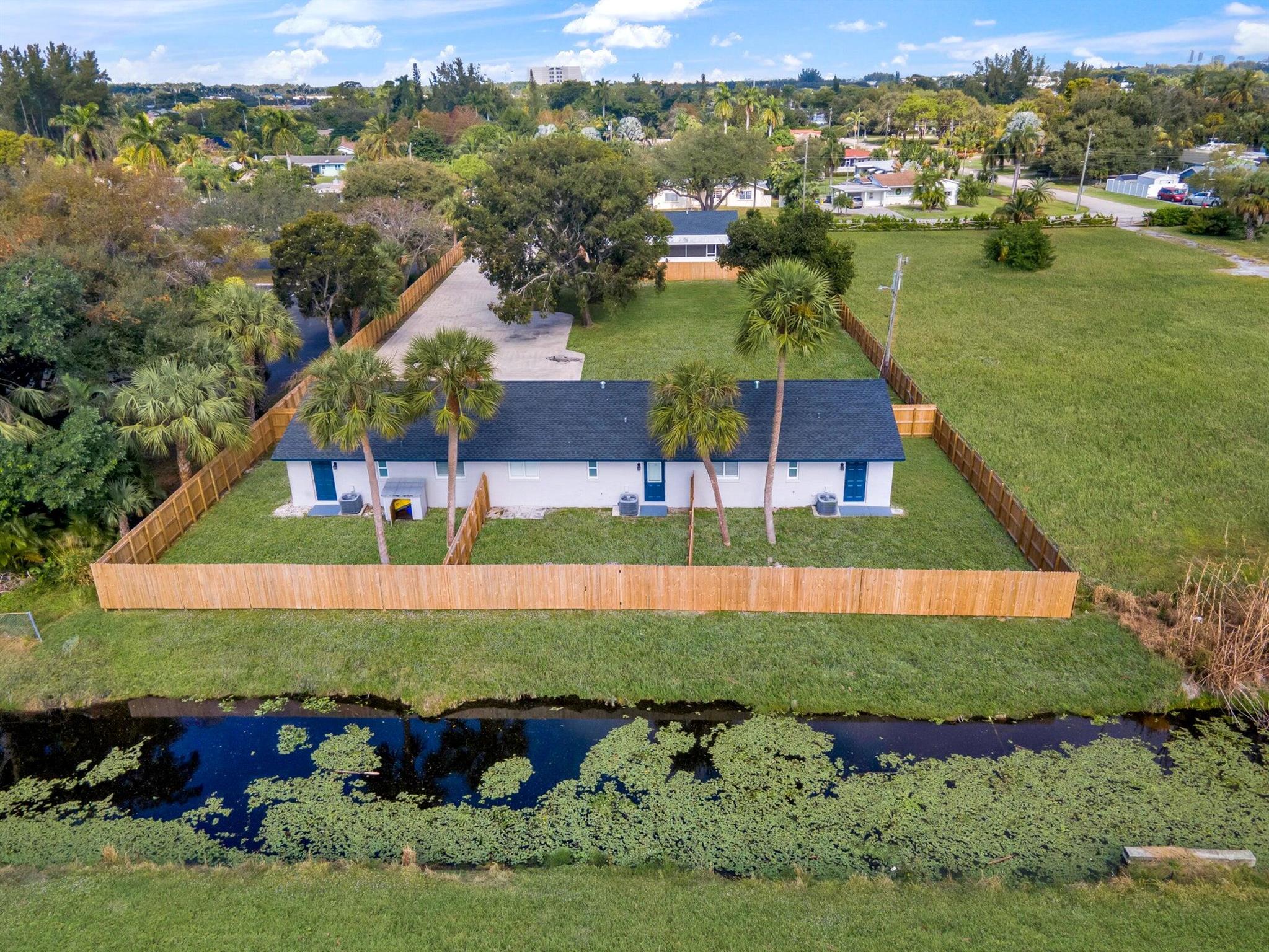 Welcome home to this nicely remodeled well appointed & cozy villa/apt featuring impact windows and fence, near Forest Hill & Congress in West Palm Beach, FL. This charming villa/apt offers a comfortable and convenient living experience with ample space to relax and unwind. The fenced back yard is perfect for enjoying the outdoors and family gatherings. The interior offers luxury vinyl flooring and tile, nice functional kitchen with s/s appliances, washer/dryer conveniently located in the unit, making laundry day a breeze. The breakfast area is the ideal spot to enjoy your morning cup of coffee. Located in a desirable Palm Springs.
