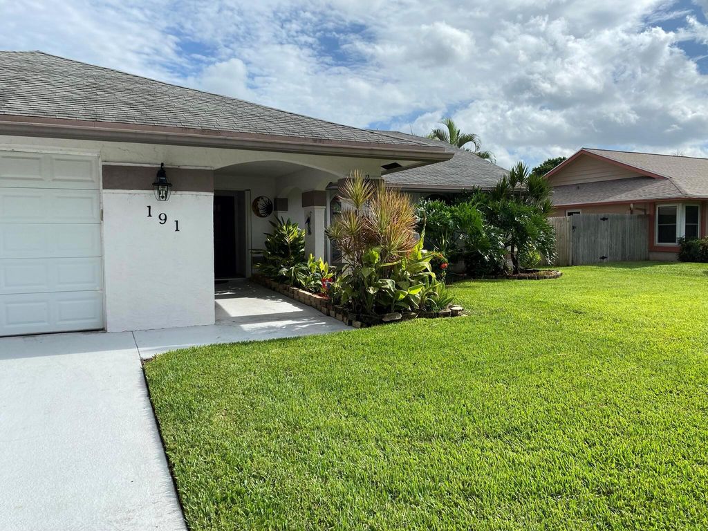 Photo of 191 Parkwood Drive, Royal Palm Beach, FL 33411 (MLS # R11043788)