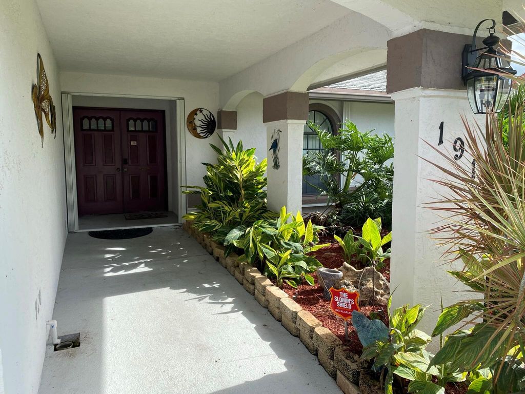 Photo of 191 Parkwood Drive, Royal Palm Beach, FL 33411 (MLS # R11043788)