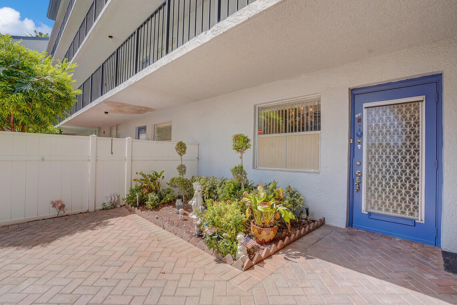 Desirable and spacious offering of a first floor condo in an attractive and private location. High ceilings, ample living/dining space and tile flooring throughout living areas. Newer appliances & washer/dryer in unit, plus 2 FULL BATHRMS, ONE RECENTLY & FULLY RENOVATED. Bedroom & living area with sliders to FABULOUS ENCLOSED FLORIDA ROOM, an inviting option for additional living space. Dedicated parking space and lots of guest parking available!Nicely maintained adult community with great amenities.NEWLY FINISHED CLUBHOUSE, WITH ALL THE BELLS AND WHISTLES ALONG WITH STUNNING RESORT POOL AND SPA. Gated entry. Convenient location minutes from shopping, restaurants, county library, and movie theater. Available furnished if desired. All measurements approximate.