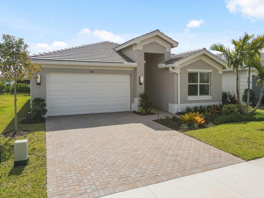 Photo of 11815 SW Silverlake Falls Drive, Port Saint Lucie, FL 34987 (MLS # R10984061)