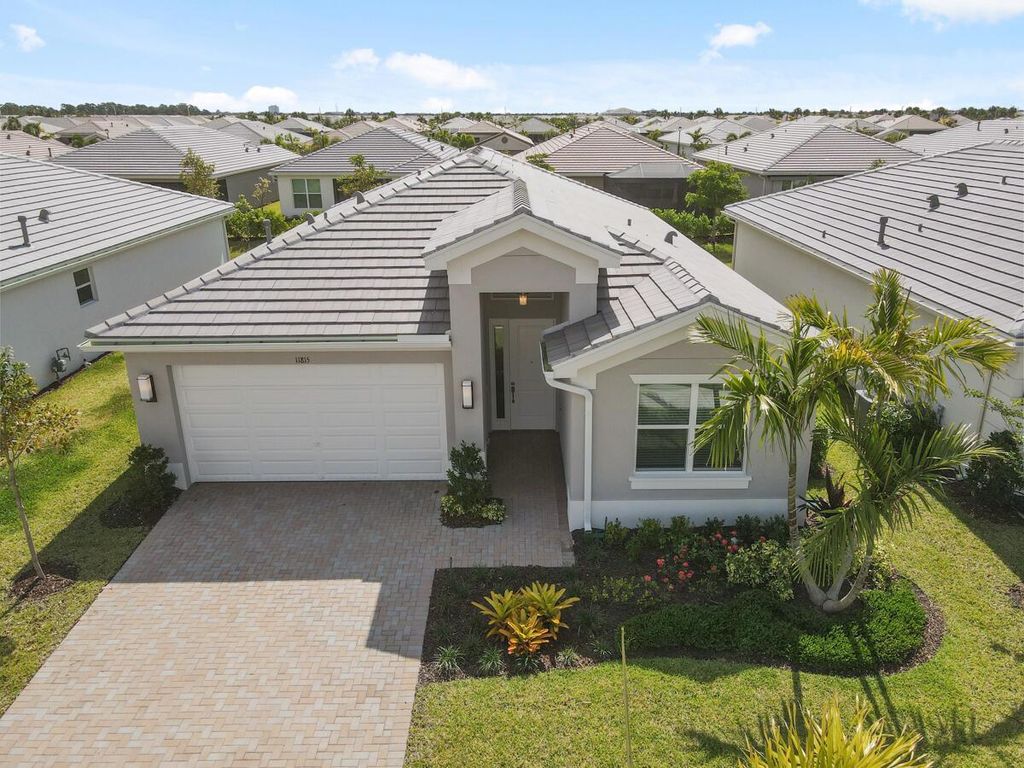 Photo of 11815 SW Silverlake Falls Drive, Port Saint Lucie, FL 34987 (MLS # R10984061)