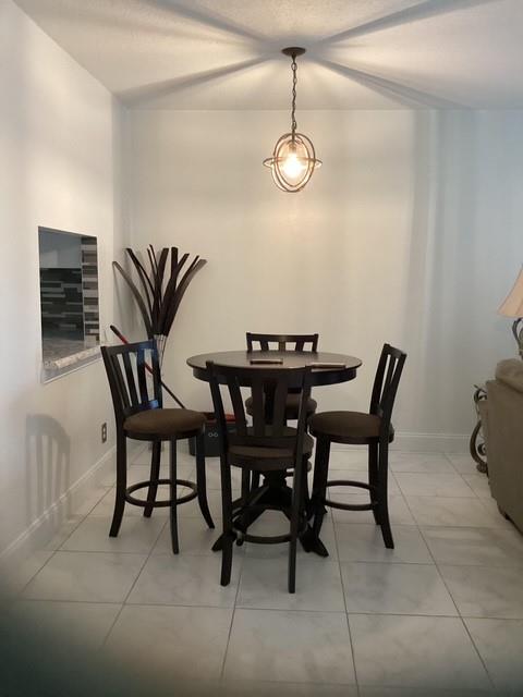 Discover this updated condo featuring modern amenities and thoughtful improvements throughout. This turnkey home offers 2 spacious bedrooms and 2 full bathrooms, complete with a nearly new AC system (only 2 years old) for year-round comfort. The property boasts a newer kitchen with modern finishes, a new beautifully renovated master bathroom with contemporary fixtures, and the entire condo has been freshly painted throughout in attractive neutral tones. Added peace of mind comes with the brand new roof installed in 2024, while the building maintains strong reserves and has successfully passed its 50-year inspection requirements. .