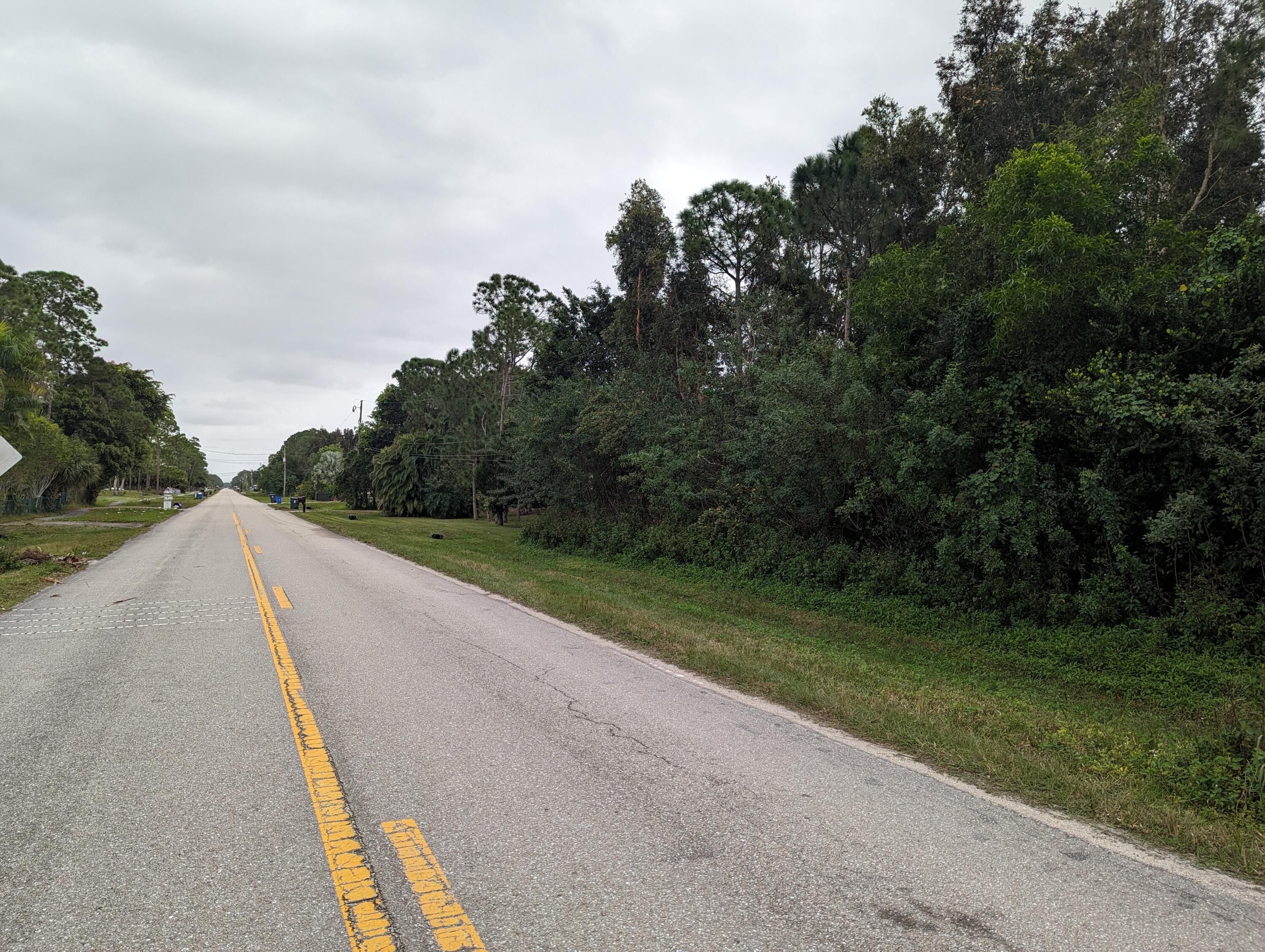 Fantastic home site on a paved road. Loaded with tall pines and surrounded by very nice homes. 5 Star beauty. Easy access to SPW and Northlake.