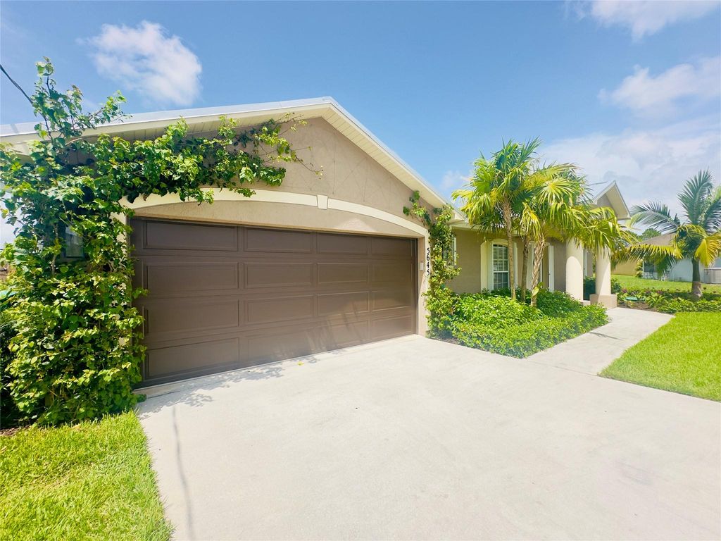 Photo of 5645 NW Lorna Court, Port Saint Lucie, FL 34986 (MLS # F10452288)