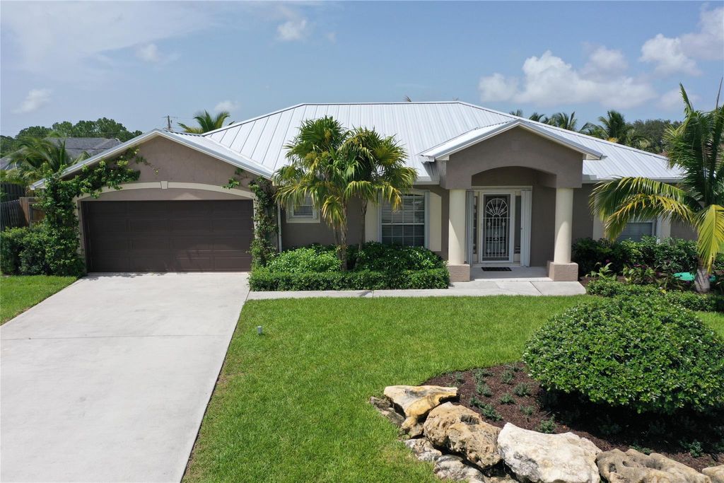 Photo of 5645 NW Lorna Court, Port Saint Lucie, FL 34986 (MLS # F10452288)