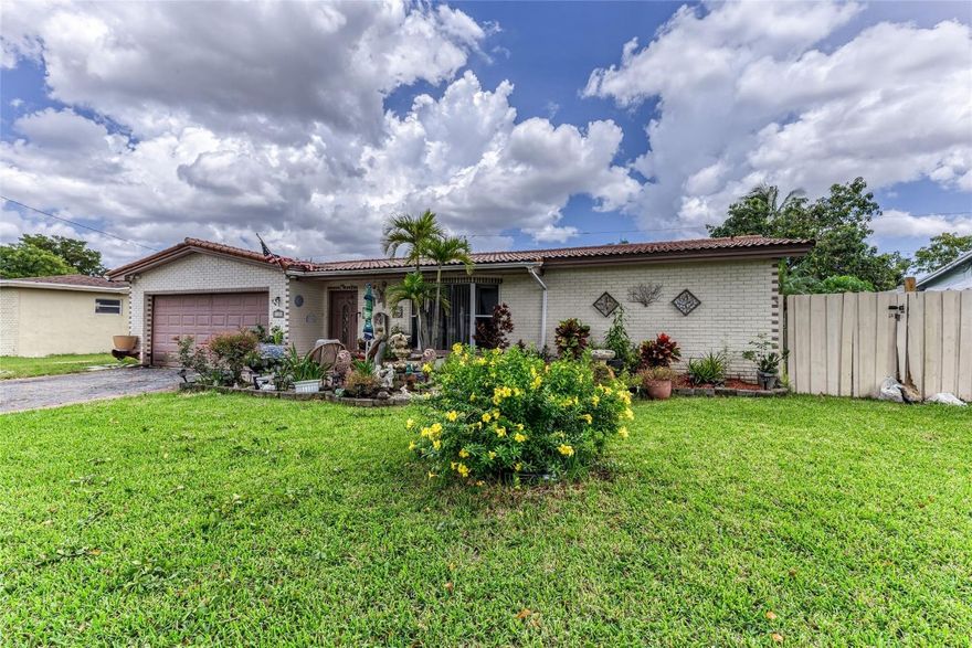 Spacious 4 bedroom, 2 bathroom single family home with large fenced backyard and pool. Firestone glazed tile roof with 3 step cedar fascia, designed for long roof life.  Open floor plan is perfect for entertaining with real hardwood floors thru-out. Master bedroom has wood flooring and walk-in closet. Master bathroom has walk-in shower and tile flooring. Guest bathroom has shower/bathtub combination. 2-car garage with plenty of space to park an RV and boat. Entry doors to the house and garage are hurricane-rated. Cast iron sewer pipes previously replaced with PVC.  Walking distance to pre-school and elementary school. NO HOA.
