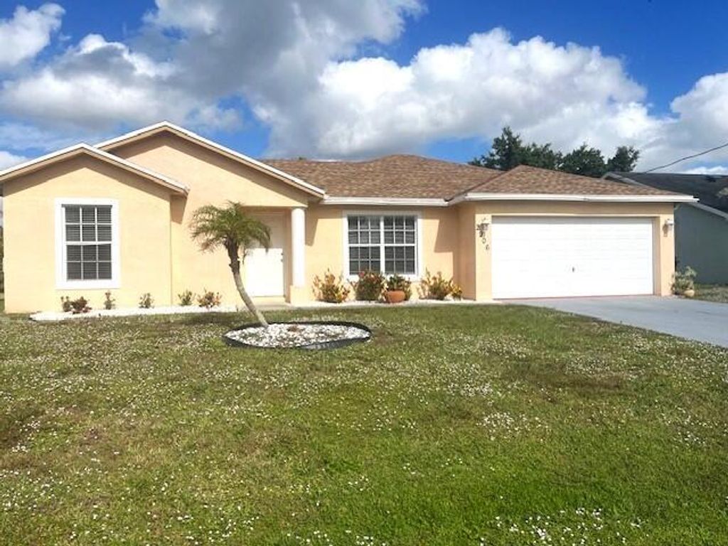Photo of 2906 SW Boxwood Circle, Port Saint Lucie, FL 34953 (MLS # R10942174)